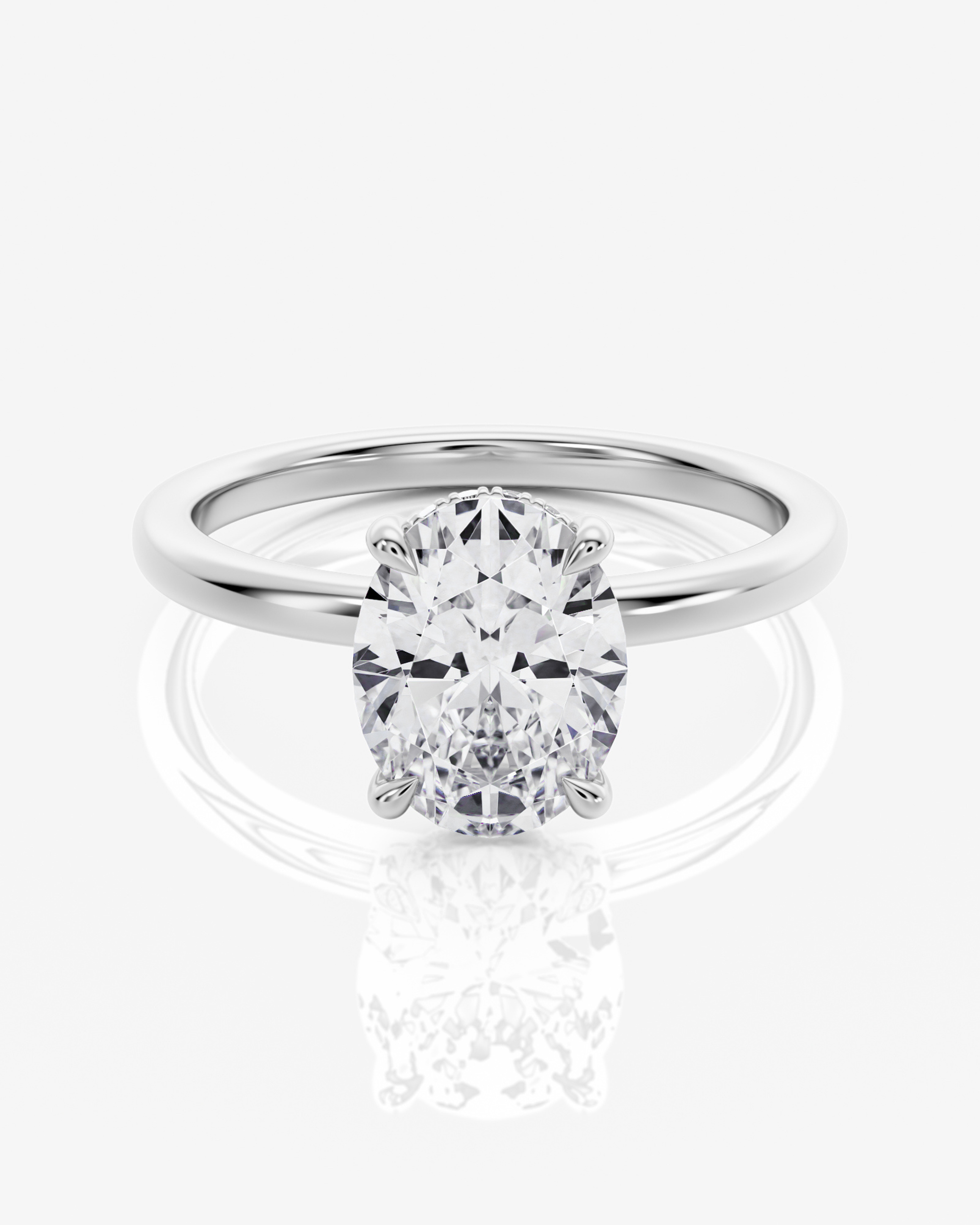 Celeste Solitär Hidden Halo Oval förlovningsring i 18K vitt guld med ovalslipad diamant, framifrån