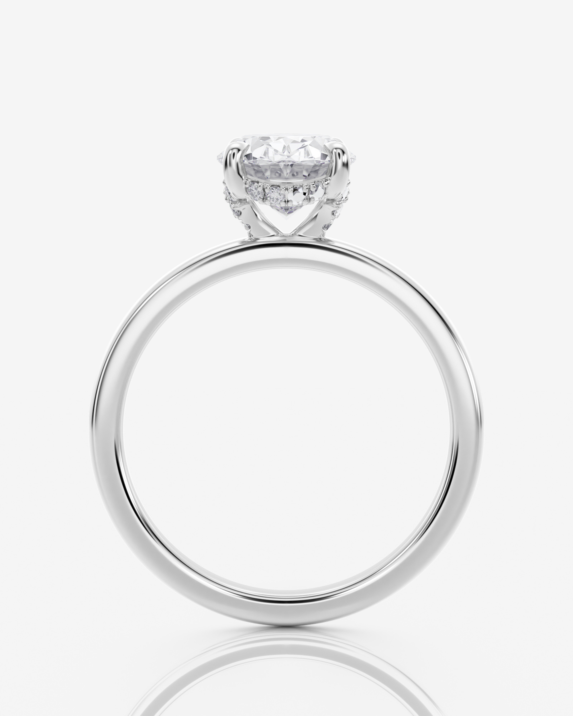 Celeste Solitär Hidden Halo Oval förlovningsring i 18K vitt guld, vy uppifrån med hidden halo