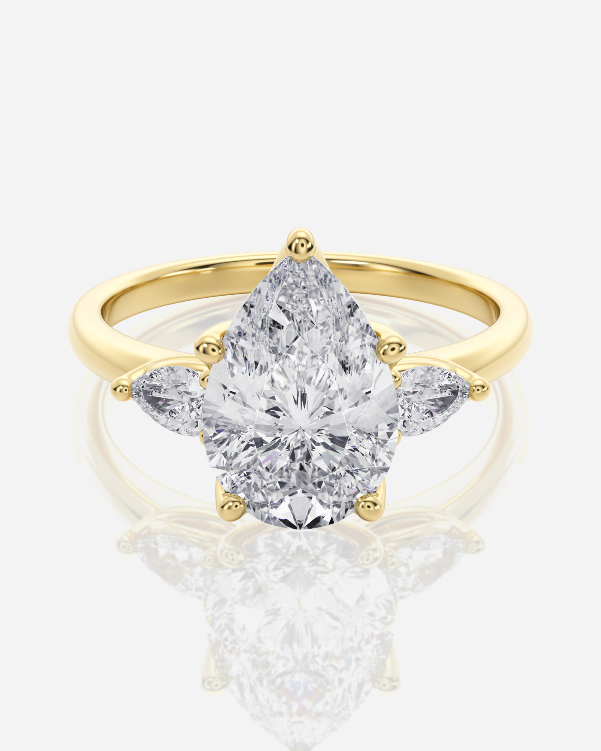 Francesca Tulip Trestensring i 18K guld med päronformad centrumdiamant och marquisesidostenar, framifrån