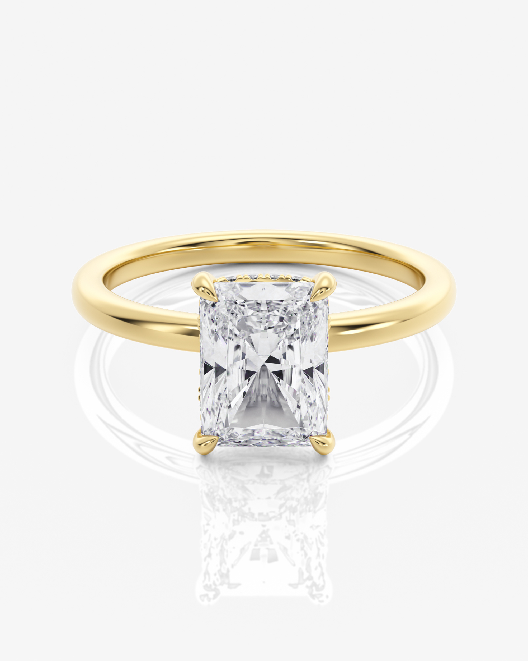 Celeste Solitär Hidden Halo Radiant förlovningsring i 18K guld med radiantslipad diamant, framifrån
