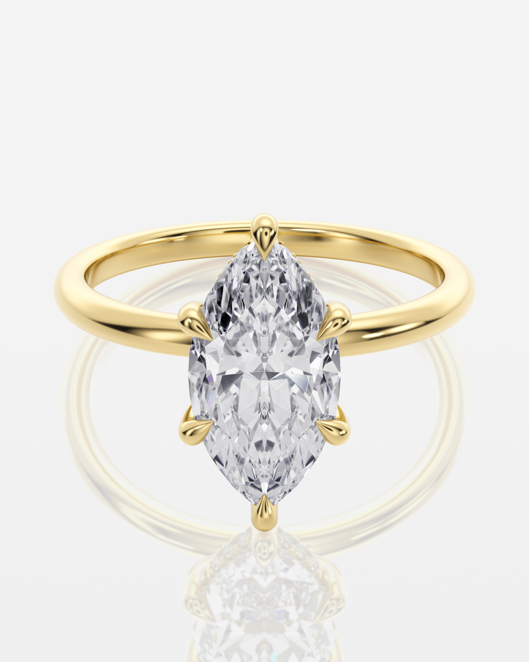 Celine Hidden Halo Marquise förlovningsring i 18K guld med marquiseslipad diamant och V-klor, framifrån