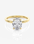 Celeste Solitär Hidden Halo Oval förlovningsring i 18K guld med ovalslipad diamant, framifrån