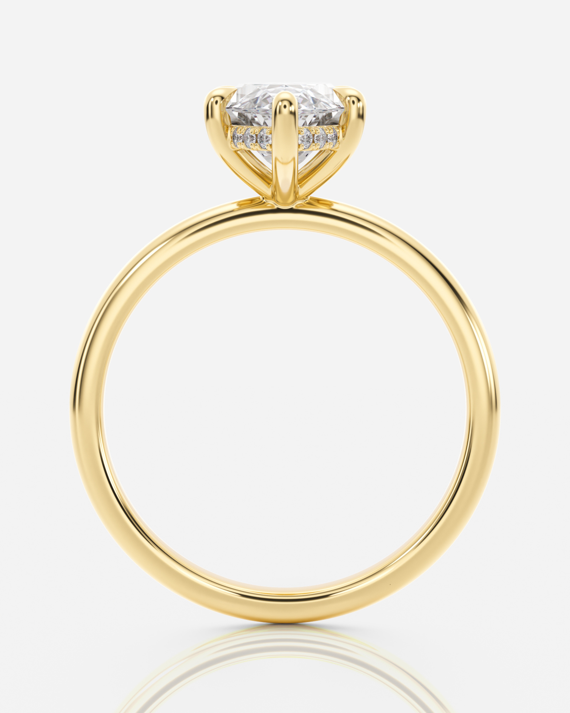 Celine Hidden Halo Marquise förlovningsring i 18K guld, sidovy med hidden halo under marquisediamanten