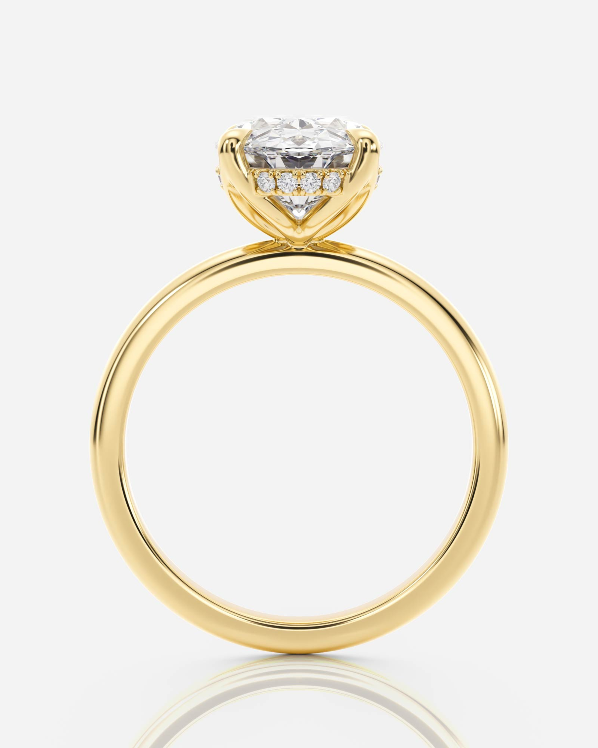 Eleonora Solitär Hidden Halo förlovningsring i 18K guld, vy uppifrån med ovalslipad diamant och hidden halo