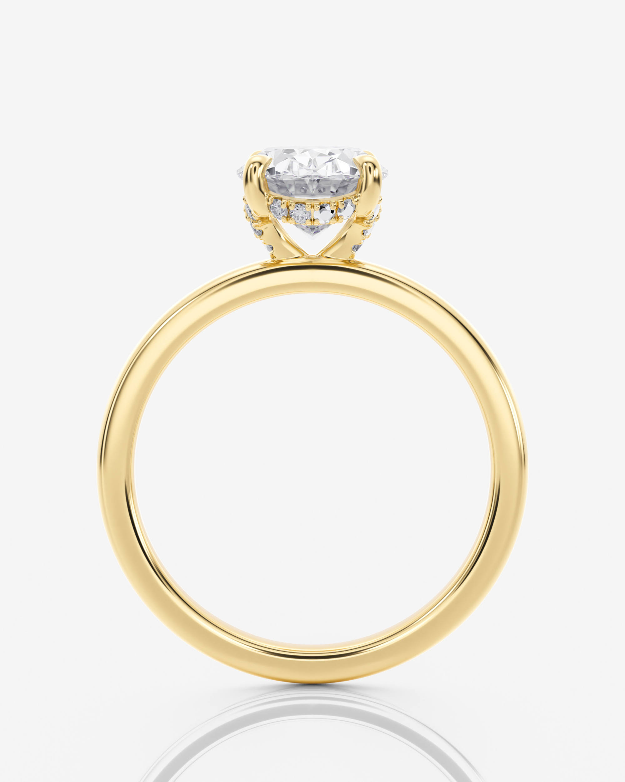 Celeste Solitär Hidden Halo Oval förlovningsring i 18K guld, sidovy med hidden halo-detalj