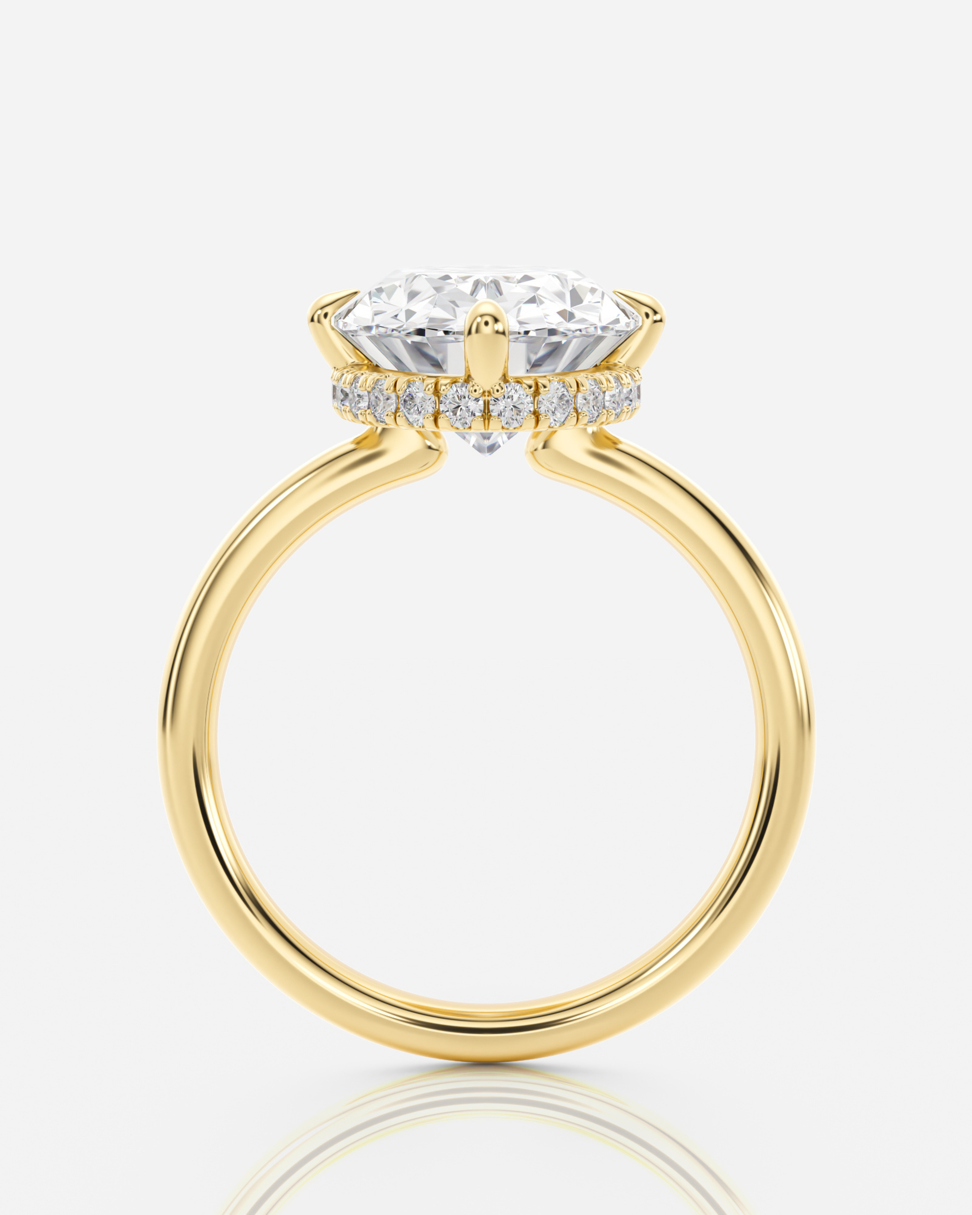 Hailey Solitär Hidden Halo Compass Claw förlovningsring i 18K guld, sidovy med hidden halo-detalj