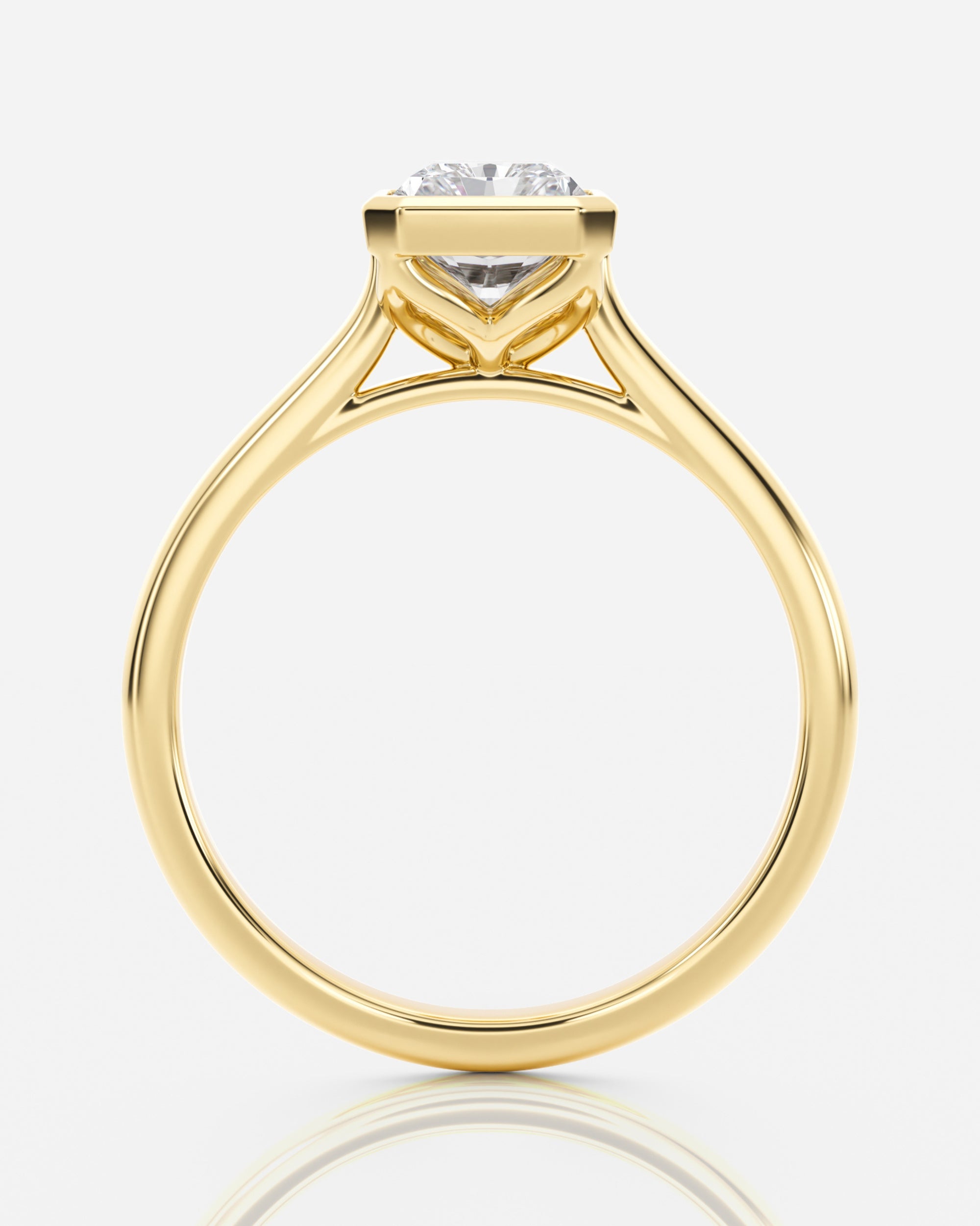 Emerald förlovningsring guld bezel från sidan – Athea Basel | Ophira & Co