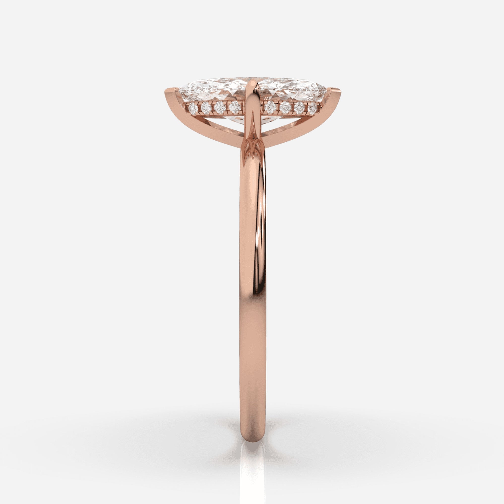 Förlovningsring roséguld från sidan – Isabella Hidden Halo Marquise | Ophira &amp; Co