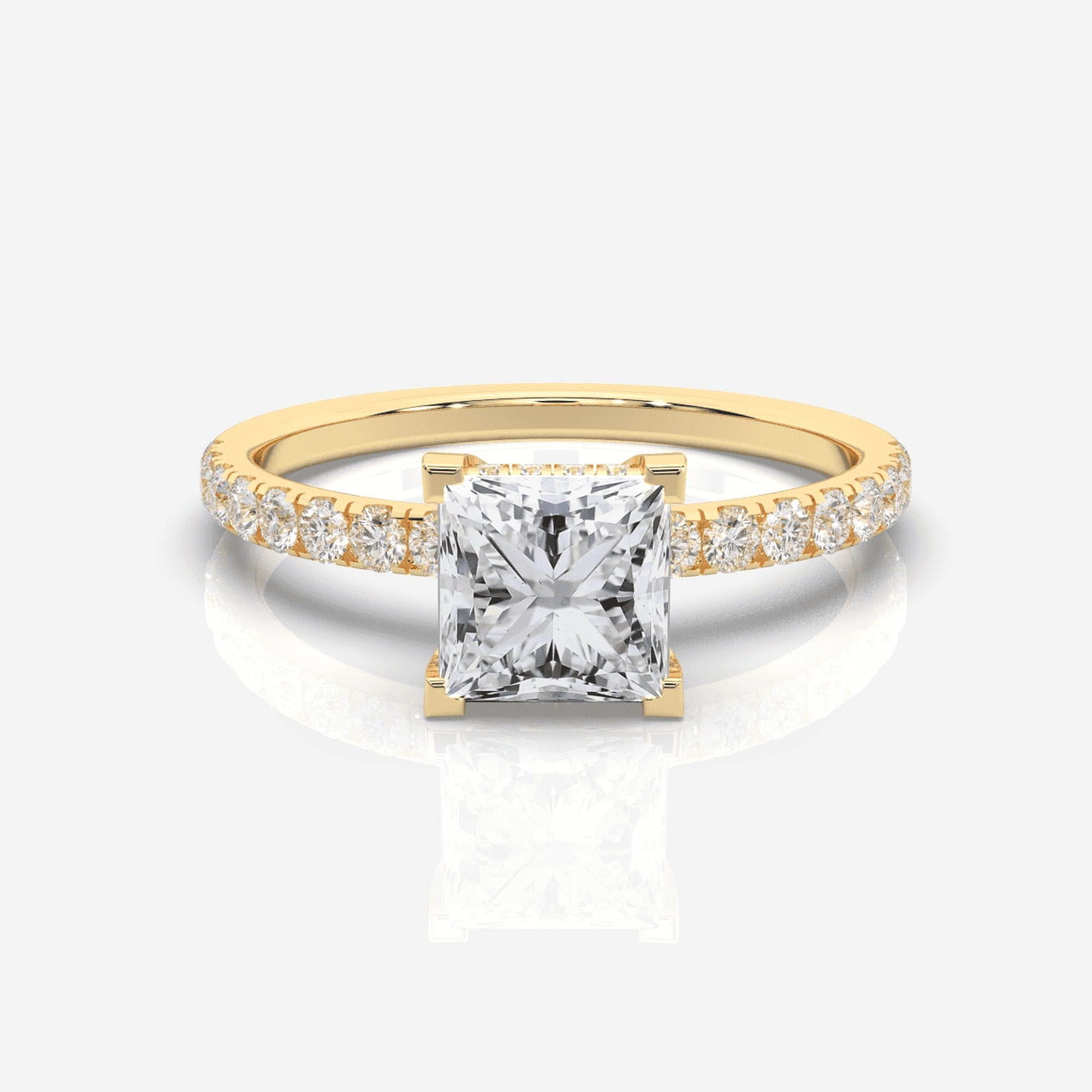 Prinsess förlovningsring 18K guld – Isabella Hidden Halo & Sidostenar | Ophira & Co