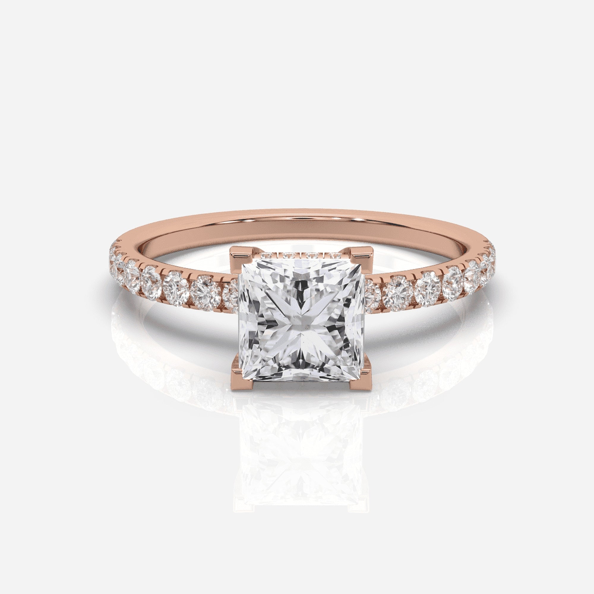 Prinsess förlovningsring 18K roséguld – Isabella Hidden Halo & Sidostenar | Ophira & Co