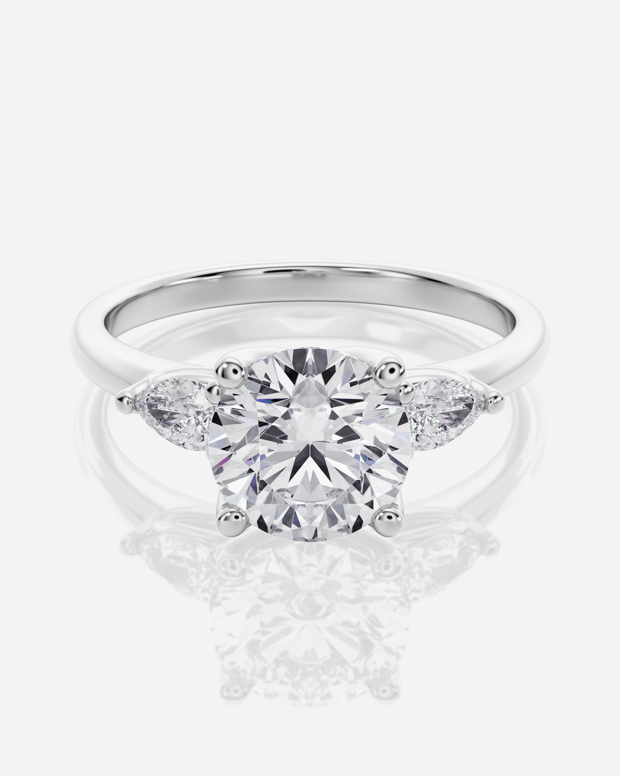 Rund trestensring 18K vitt guld päron sidostenar – Liora | Ophira &amp; Co
